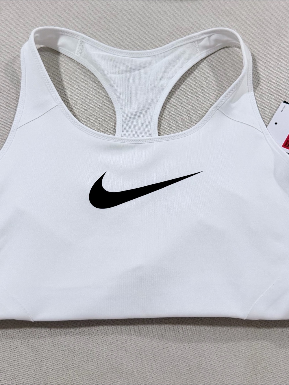 Nike White Sports Bra with Black Swoosh